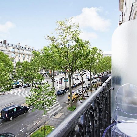 Suite junior luxueuse avec balcon et vue sur Arc de Triomphe Paris Extérieur photo