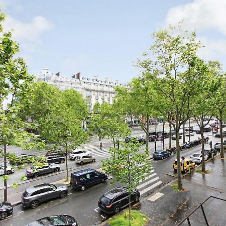 Suite junior luxueuse avec balcon et vue sur Arc de Triomphe Paris Extérieur photo